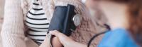 doctor measuring blood pressure
